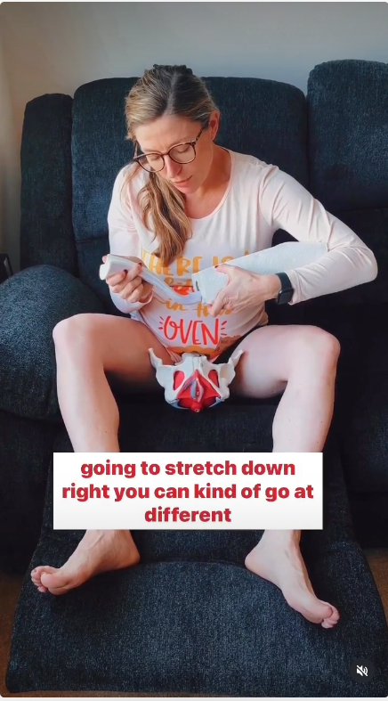 Kelly Peterson, physical therapist, demonstrating the Perimom perineal stretching tool on a pelvis model