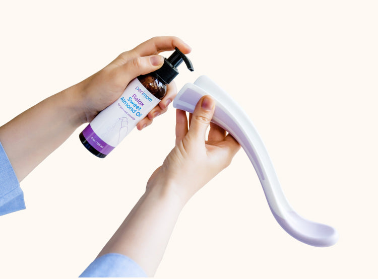 Olio di mandorle erogato nel canale dell'olio del massaggiatore perineale Perimom